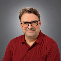 Adam J Maliszewski